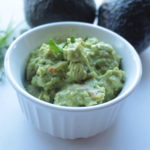 Guacamole in a white bowl