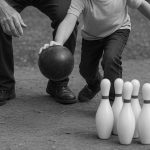Young boy Bowling for Free in Alberta