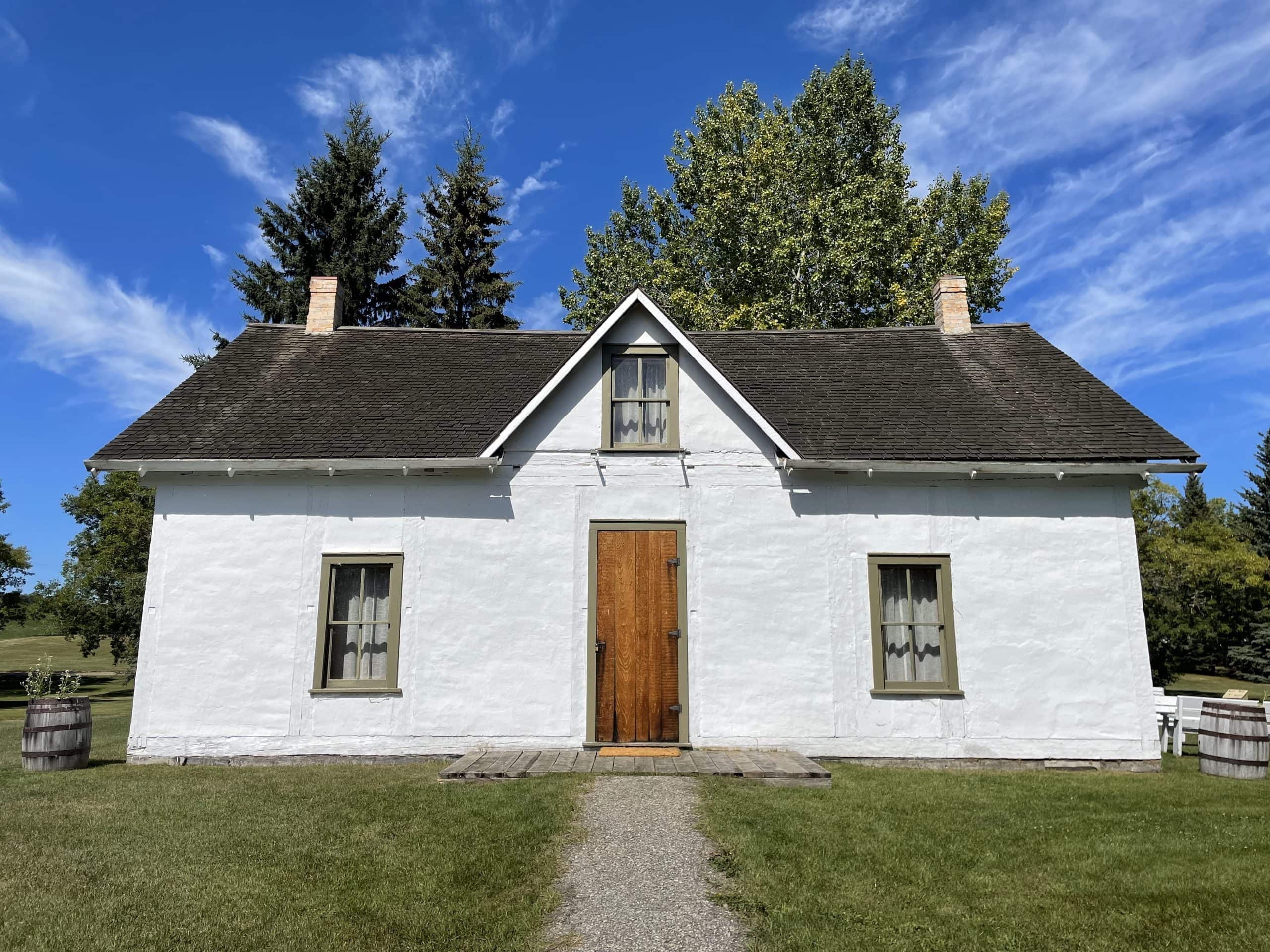 Whitewashed building of the Clerks Quarters at Victoria Settlement.