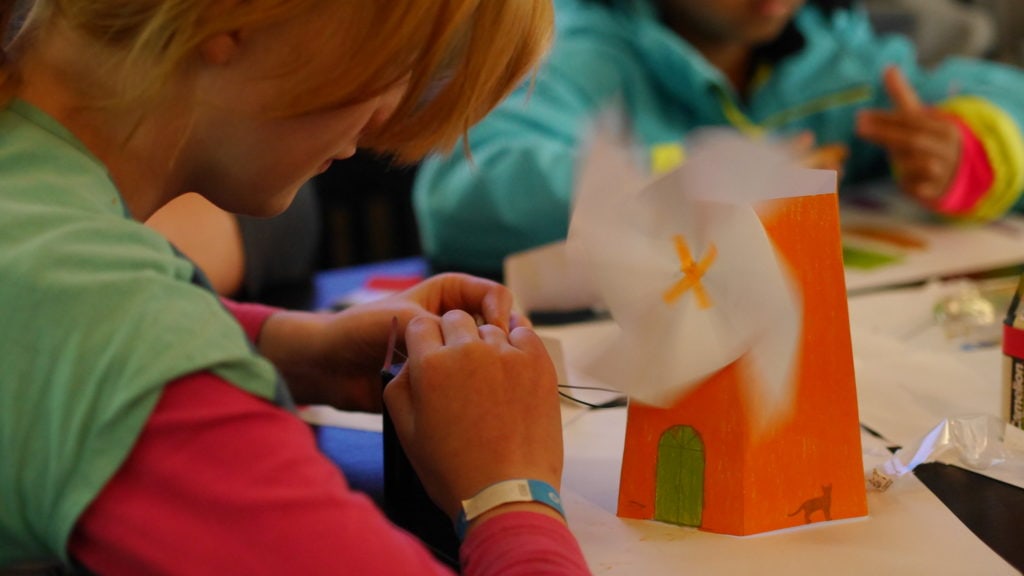 Child assembling a craft